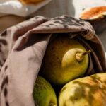 Eco-Friendly Dyes - Bags with Fresh Fruits and a Glass of Water Standing in Sunlight