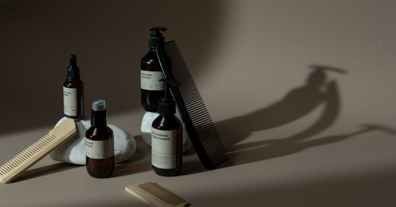 Haircare Products - Photo of Combs Near Bottles
