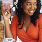 Handbag Styles - Woman Wearing Orange V-neck Overall Dress Sitting on Chair