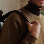 Eyewear Trends - Man in Brown Coat and Black Cap