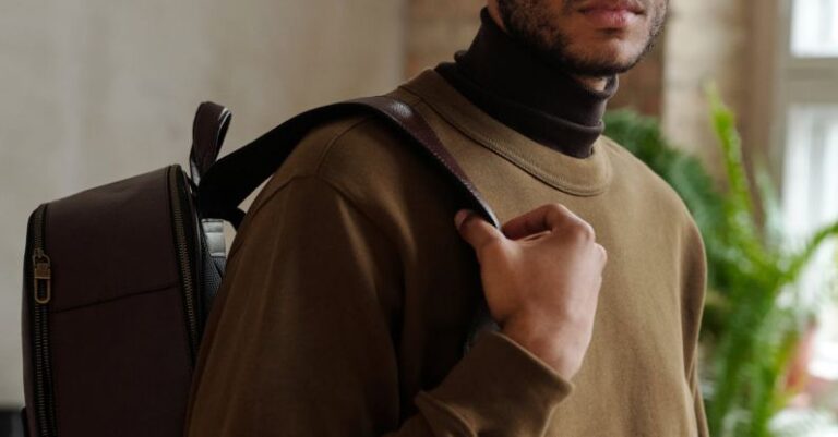 Eyewear Trends - Man in Brown Coat and Black Cap