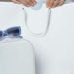 Customized Accessories - Person Holding White and Blue Vr Goggles