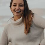 Belt Trends - Girl Standing in the Brown Grass Field