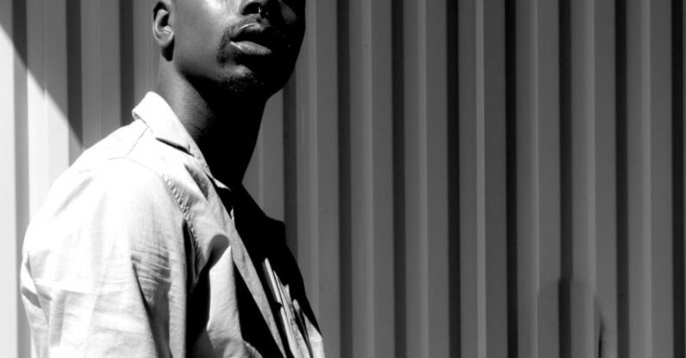 Street Style Looks - Gray-scale Photo of Man