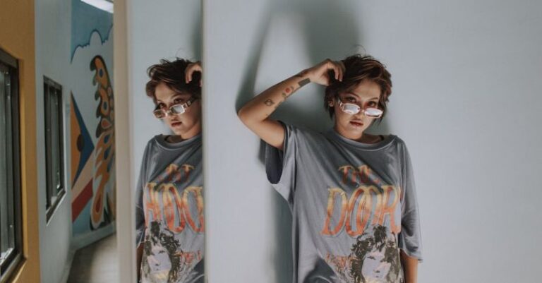 Vintage And Streetwear - A Woman Modeling in a Vintage Shirt