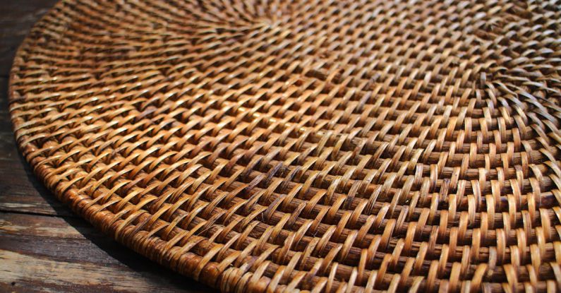 Bamboo Fabrics - Round Wicker Board on Wooden Surface