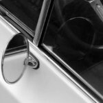 Vintage Finds - A black and white photo of a car's interior