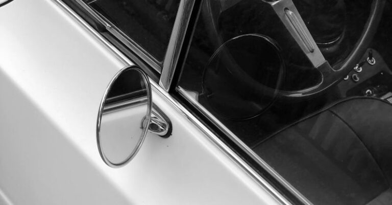 Vintage Finds - A black and white photo of a car's interior