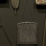 Vintage Handbag - A wall of purses and bags hanging on a wall