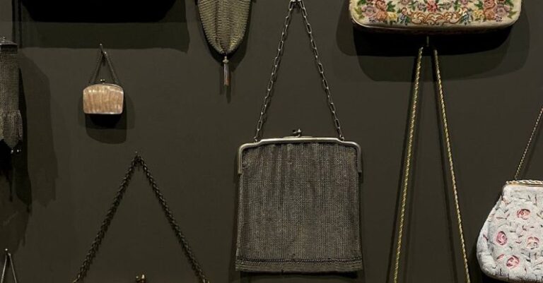 Vintage Handbag - A wall of purses and bags hanging on a wall