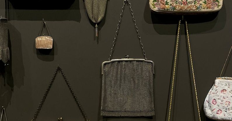 Vintage Handbag - A wall of purses and bags hanging on a wall