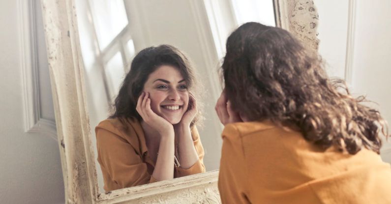 Vintage Look - Photo of Woman Looking at the Mirror