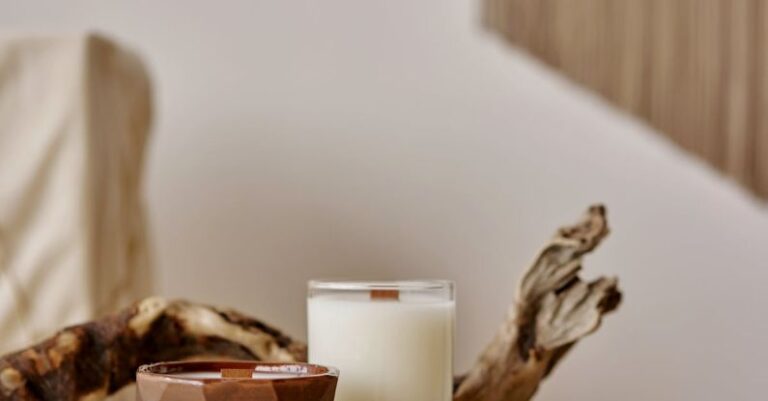 Fabric Origins - Wax candle placed near snag on pedestal